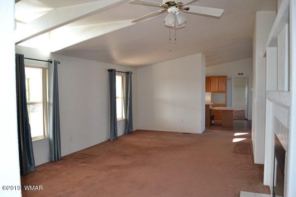 735 2300 North Snowflake, AZ 85937 - Photo 3 of 59 a view of an empty room with a window