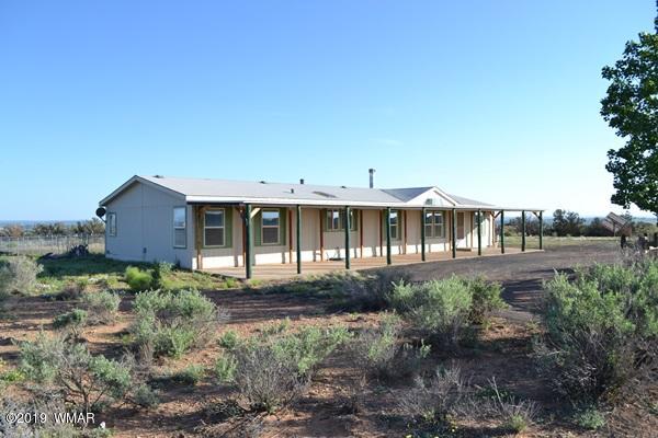 735 2300 North Snowflake, AZ 85937 - Photo 56 of 59 a front view of a house with a yard