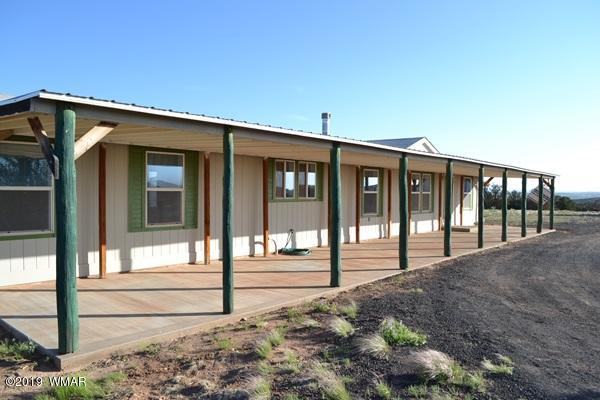 735 2300 North Snowflake, AZ 85937 - Photo 58 of 59 a view of a house with a floor to ceiling window and stairs