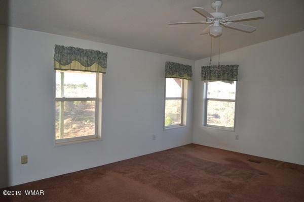 735 2300 North Snowflake, AZ 85937 - Photo 7 of 59 a view of an empty room with a window