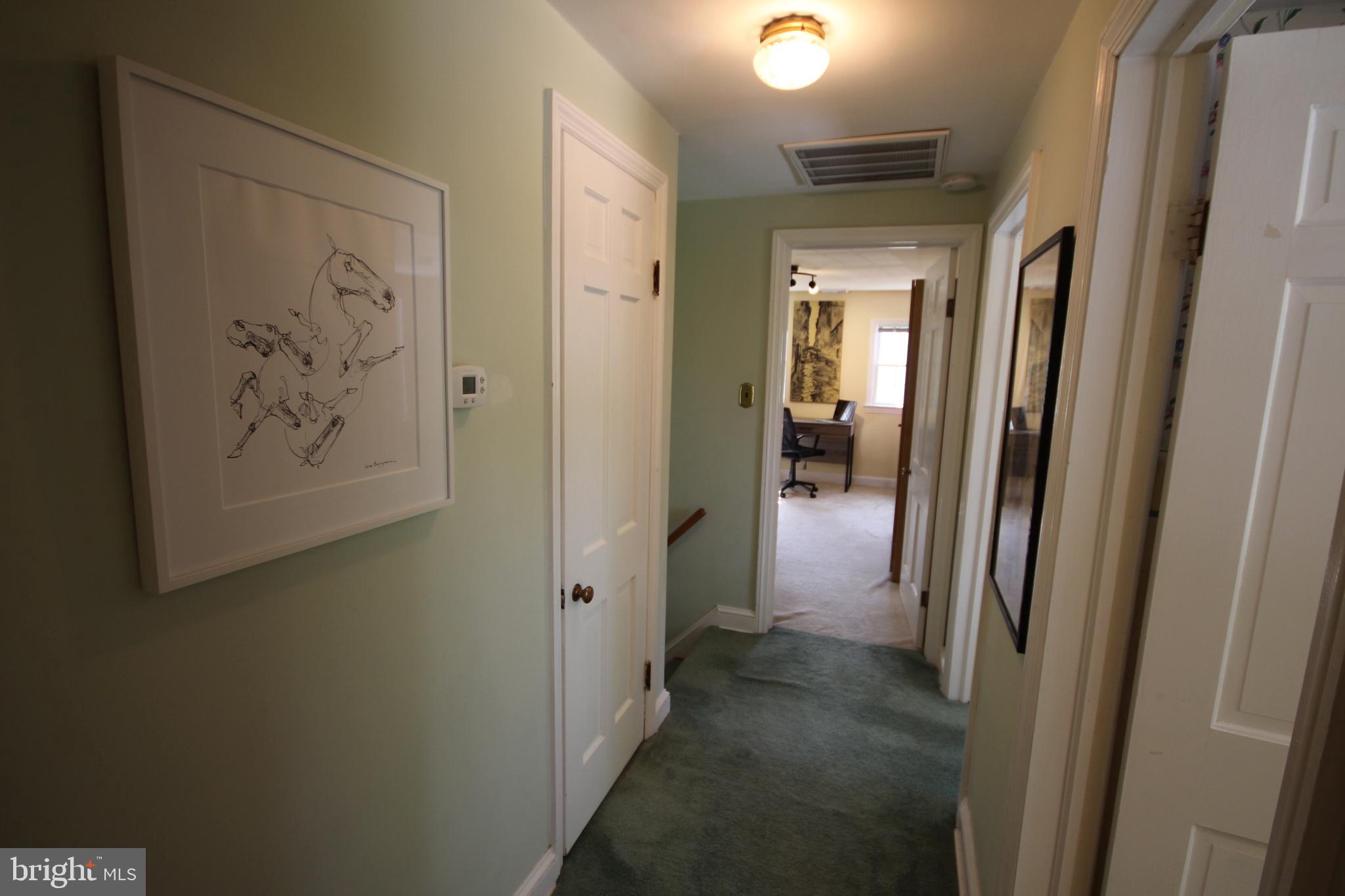 1008 Evergreen Road Yardley, PA 19067 - Photo 56 of 74 2nd fl hallway w/walk-in closet storage & dresser