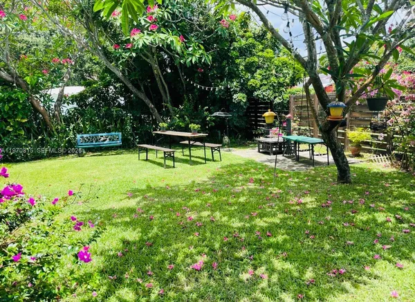 a view of a bench in a garden
