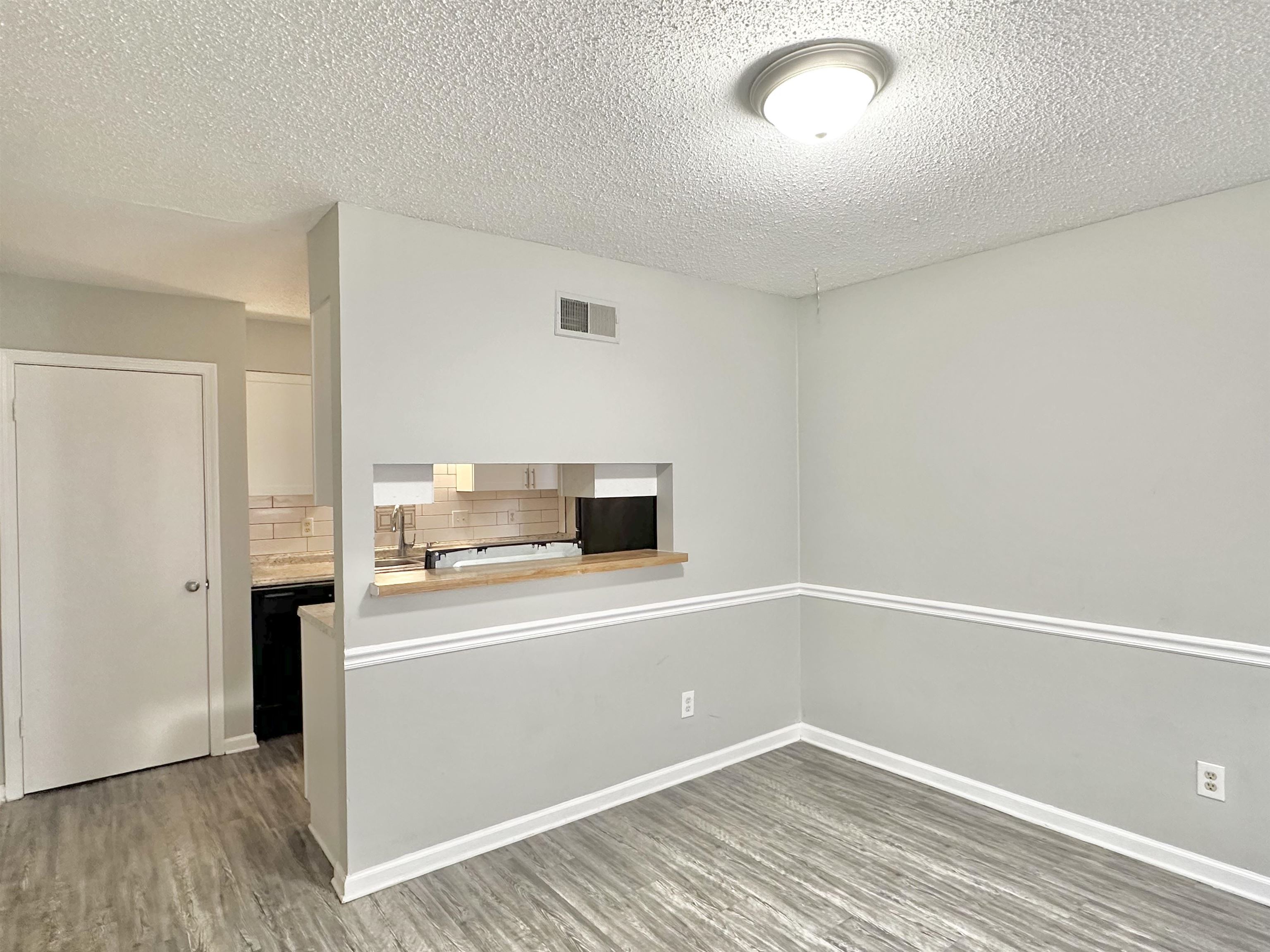 2065 Goldbrier Lane, Unit 2067 Memphis, TN 38134 - Photo 20 of 22 a view of a kitchen with a sink and dishwasher