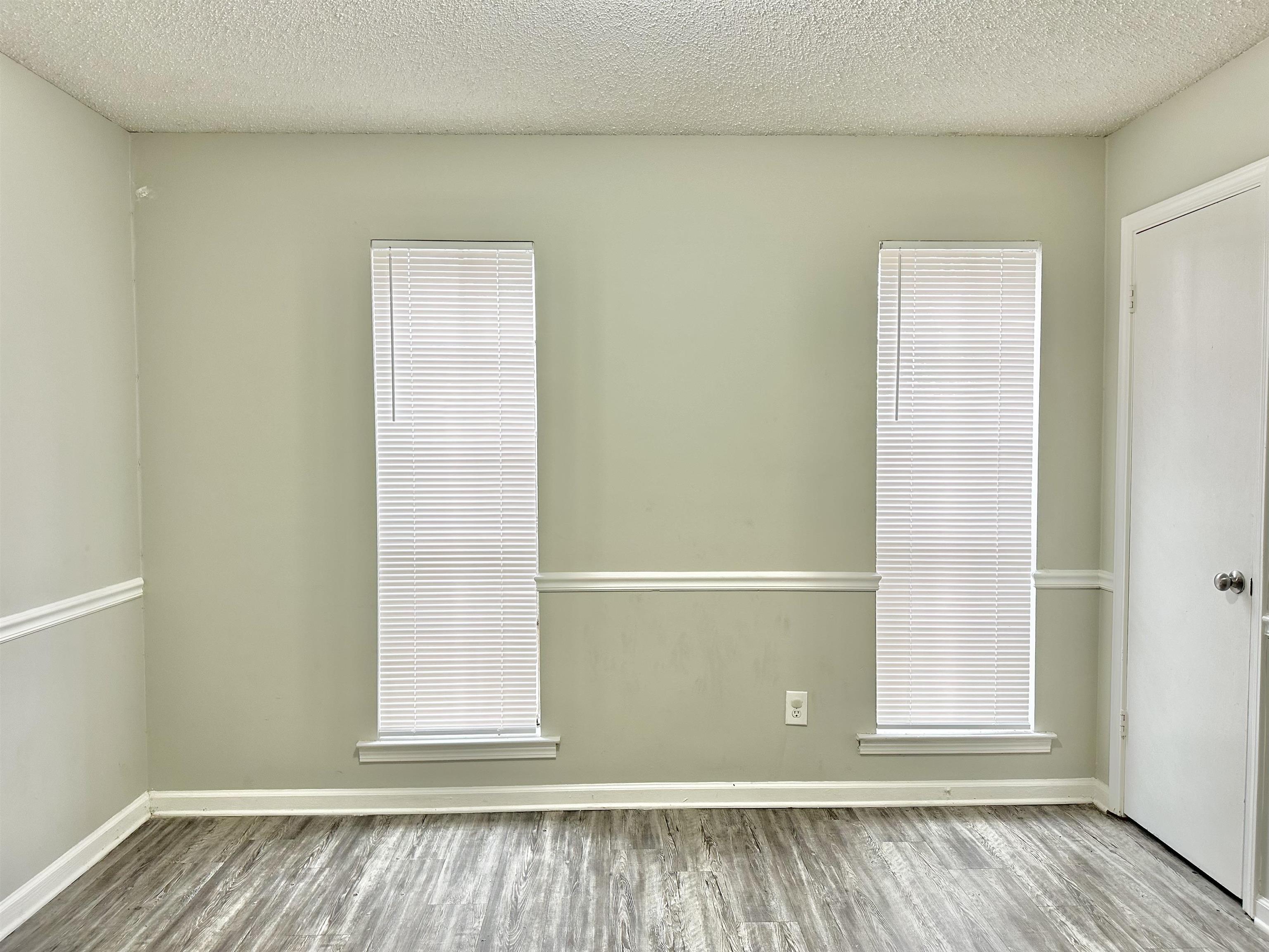 2065 Goldbrier Lane, Unit 2067 Memphis, TN 38134 - Photo 22 of 22 a view of a small space with wooden floor and a window