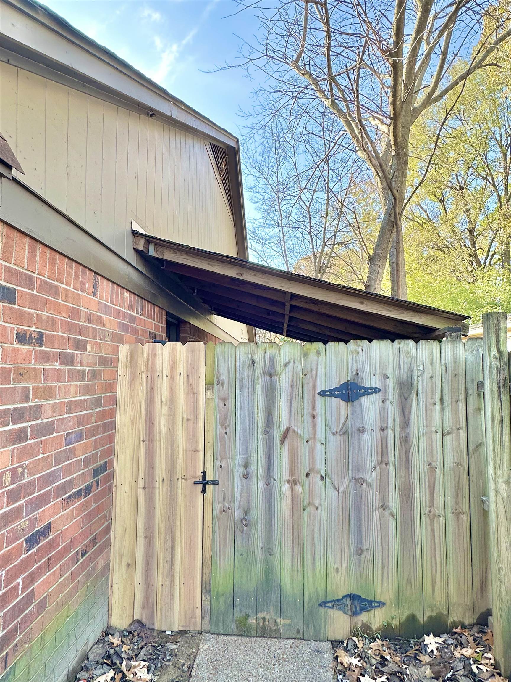 2065 Goldbrier Lane, Unit 2067 Memphis, TN 38134 - Photo 7 of 22 a front view of a house with a street