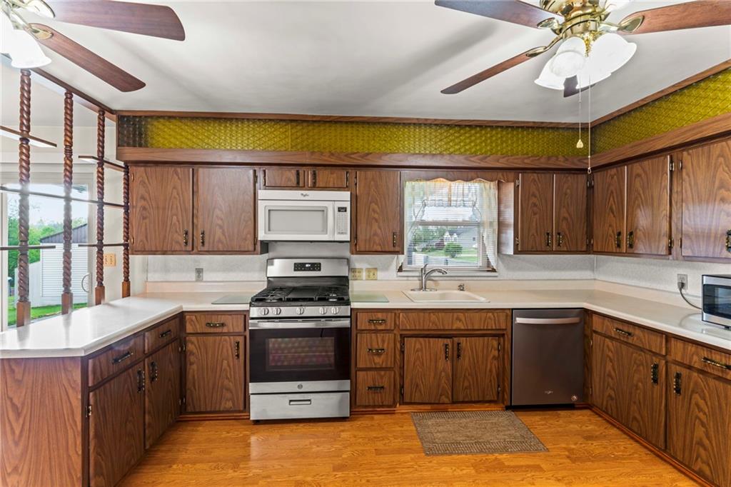 802 Gladden Road Canonsburg, PA 15317 - Photo 13 of 30 The gas stove, dishwasher and counter microwave are all newer Stainless Steel.