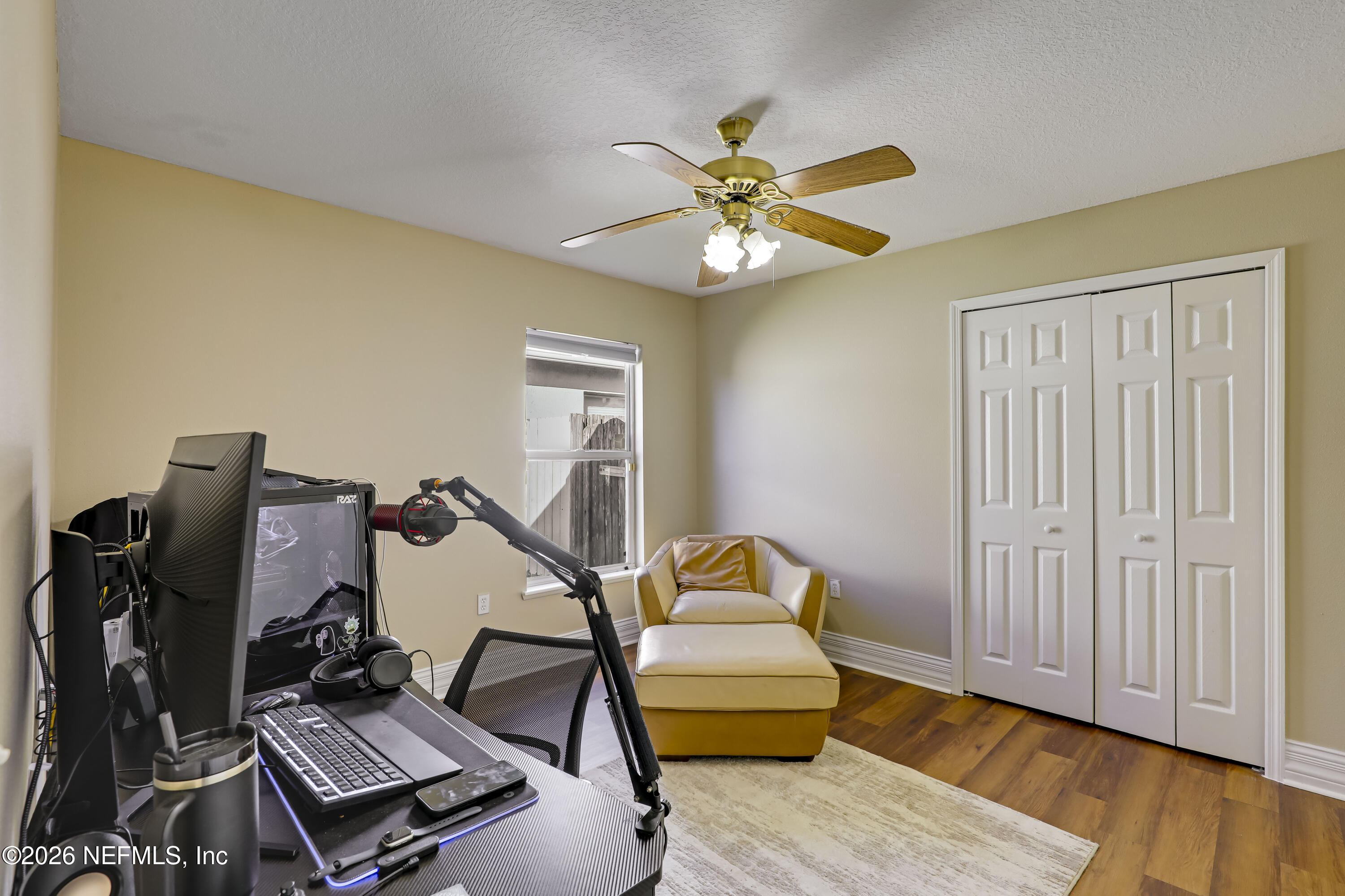 12559 Reeding Ridge Drive North Jacksonville, FL 32225 - Photo 13 of 42 a living room with furniture and wooden floor