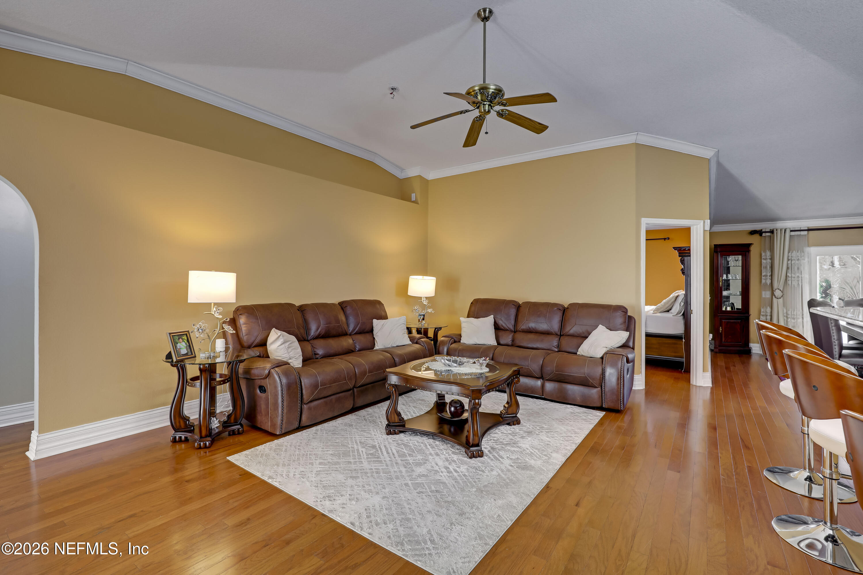 12559 Reeding Ridge Drive North Jacksonville, FL 32225 - Photo 15 of 42 a living room with furniture and wooden floor