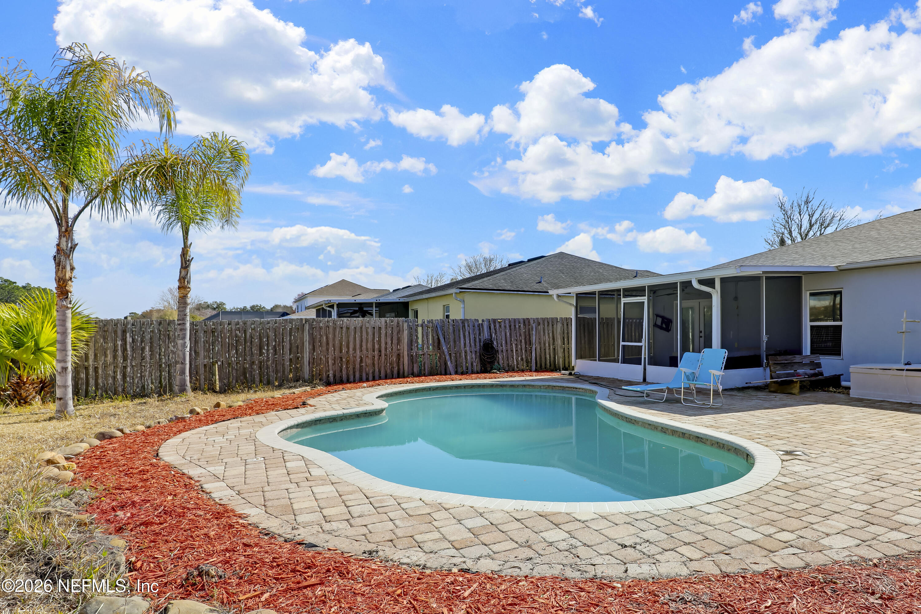 12559 Reeding Ridge Drive North Jacksonville, FL 32225 - Photo 2 of 42 a view of a house with swimming pool and sitting area