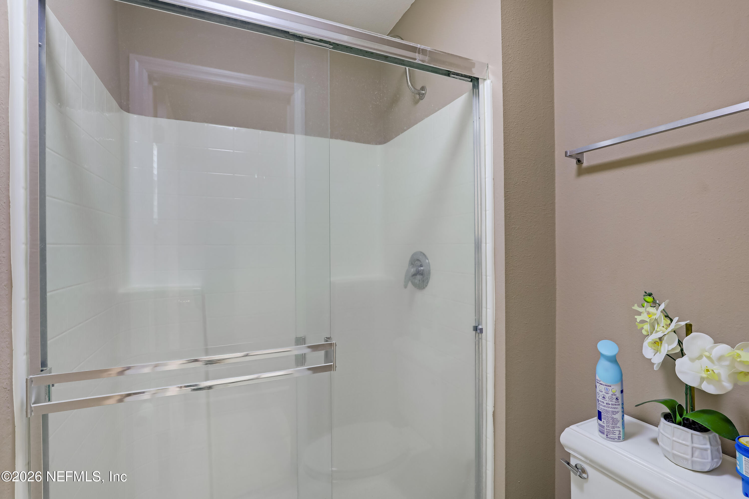 12559 Reeding Ridge Drive North Jacksonville, FL 32225 - Photo 34 of 42 a bathroom with a shower