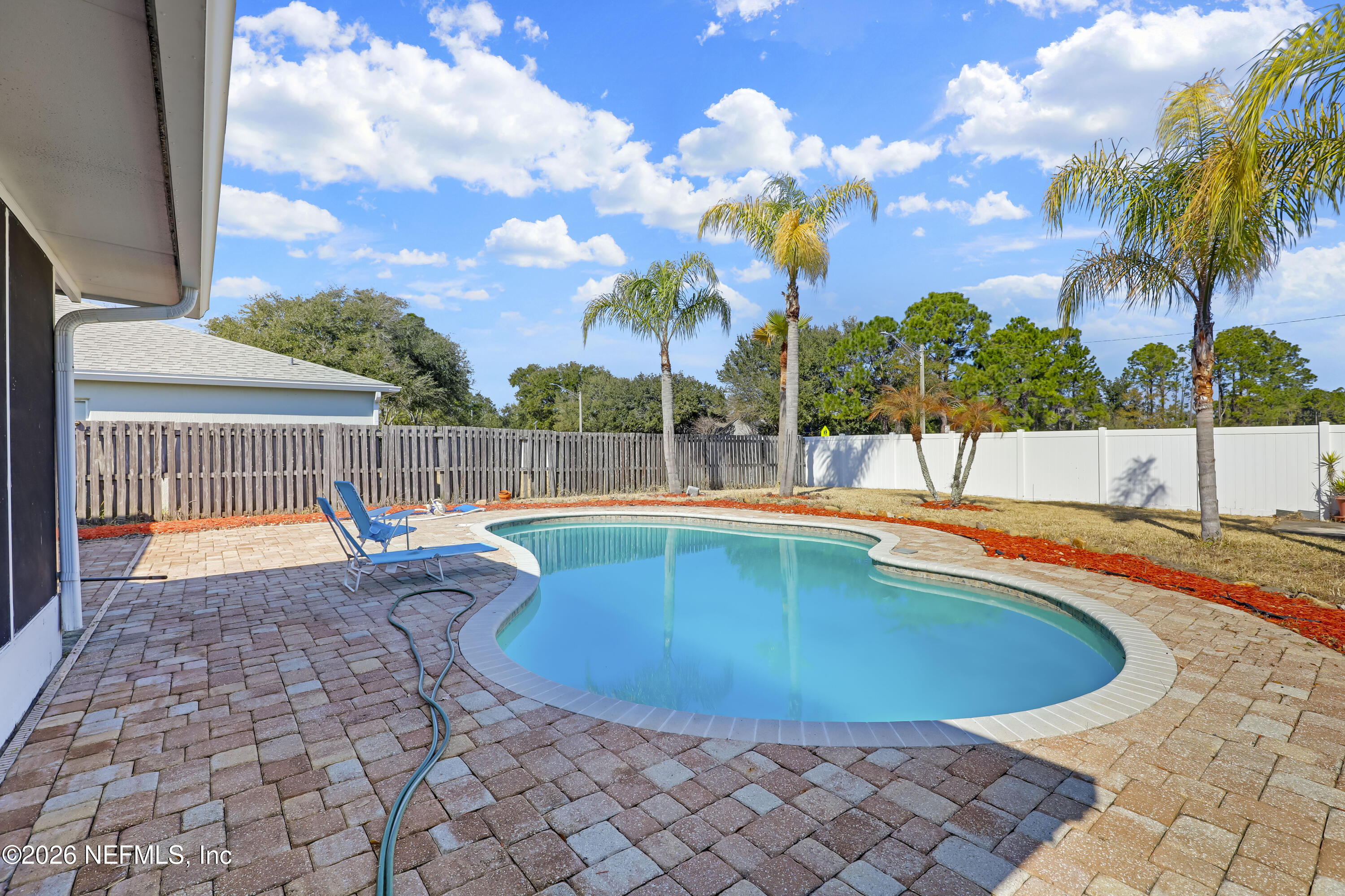 12559 Reeding Ridge Drive North Jacksonville, FL 32225 - Photo 37 of 42 a view of swimming pool with seating space