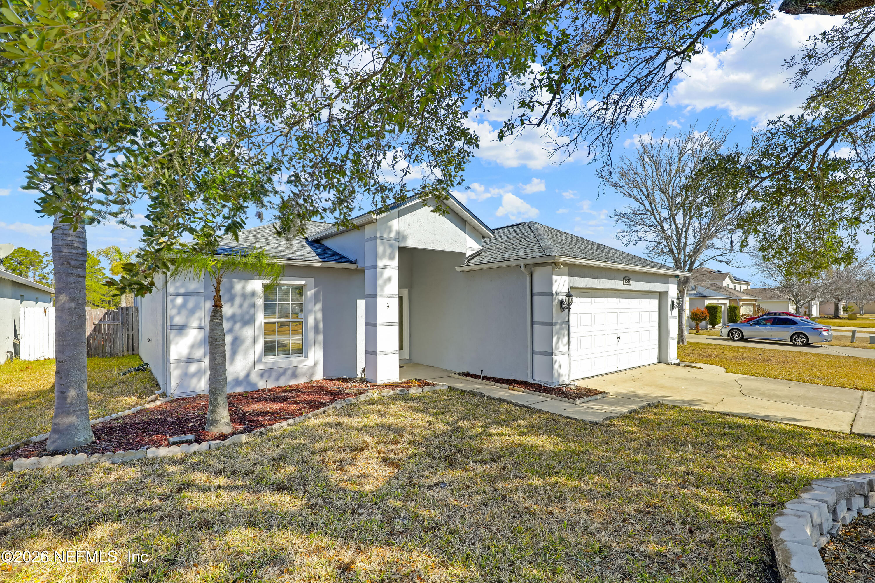 12559 Reeding Ridge Drive North Jacksonville, FL 32225 - Photo 42 of 42 a front view of a house with a yard