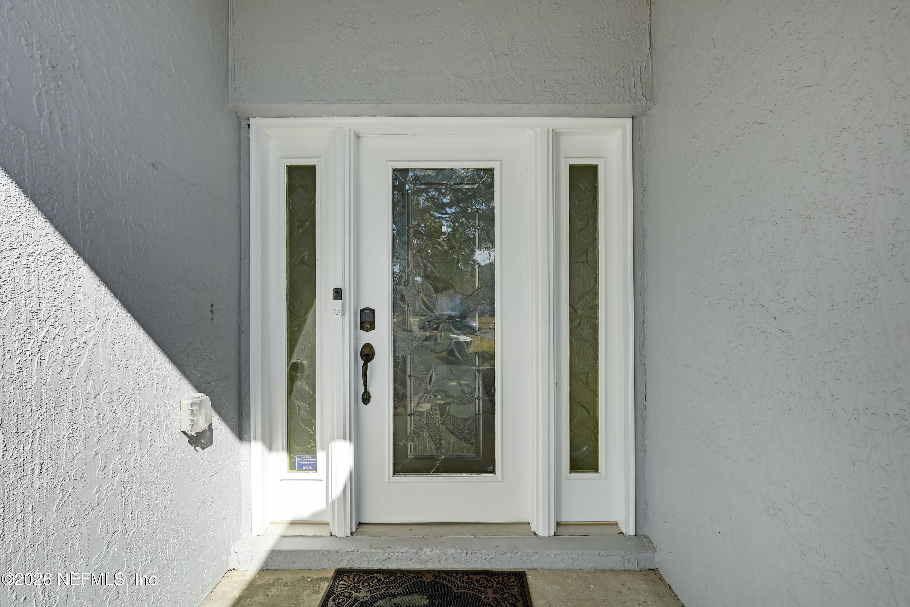 12559 Reeding Ridge Drive North Jacksonville, FL 32225 - Photo 7 of 42 a view of a entryway door