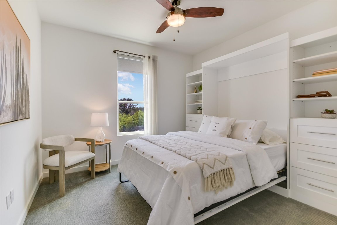 1916 Bunche Road Austin, TX 78721 - Photo 16 of 22 a bedroom with a bed and a window