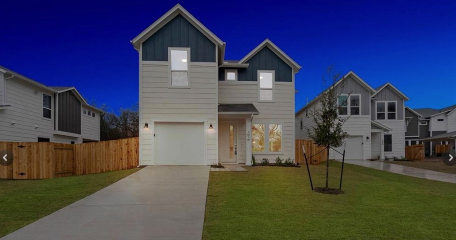 1916 Bunche Road Austin, TX 78721 - Photo 3 of 22 a front view of a house with a yard