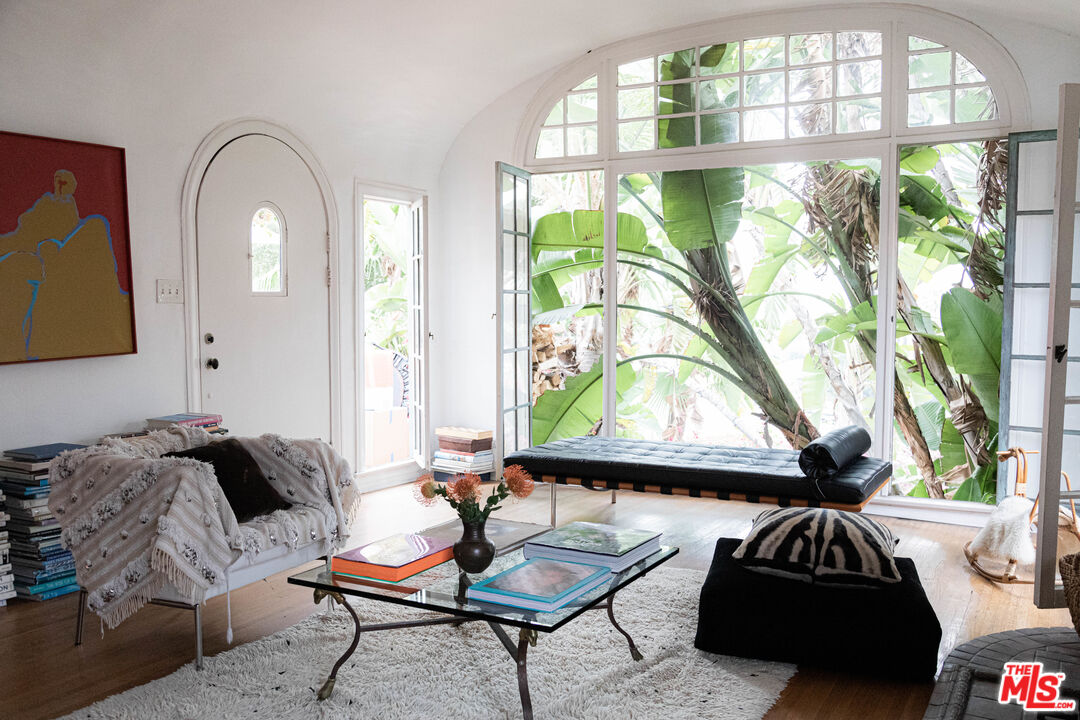 1515 Murray Circle Los Angeles, CA 90026 - Photo 15 of 40 a living room with a couch and a large window