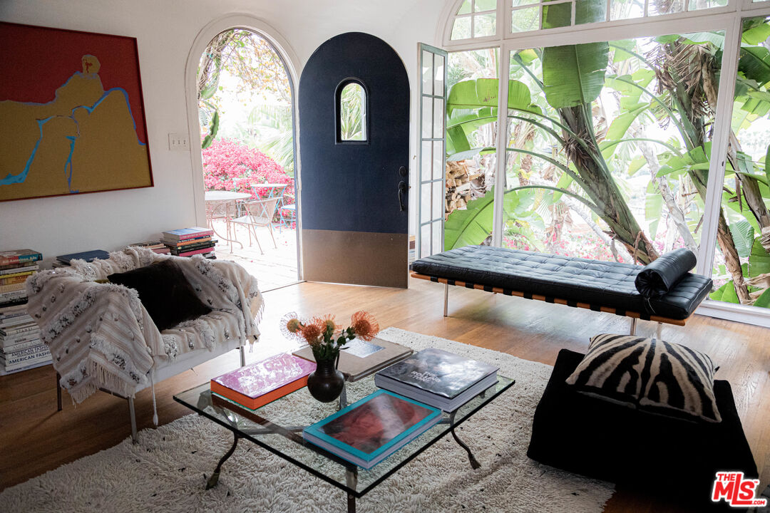 1515 Murray Circle Los Angeles, CA 90026 - Photo 16 of 40 a living room with furniture fireplace and a large window