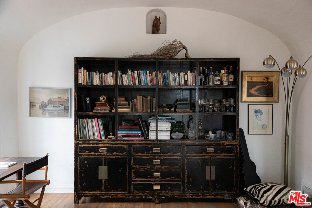 1515 Murray Circle Los Angeles, CA 90026 - Photo 19 of 40 a table with books and knick knacks on it