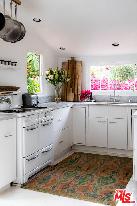1515 Murray Circle Los Angeles, CA 90026 - Photo 2 of 40 a kitchen with cabinets and window