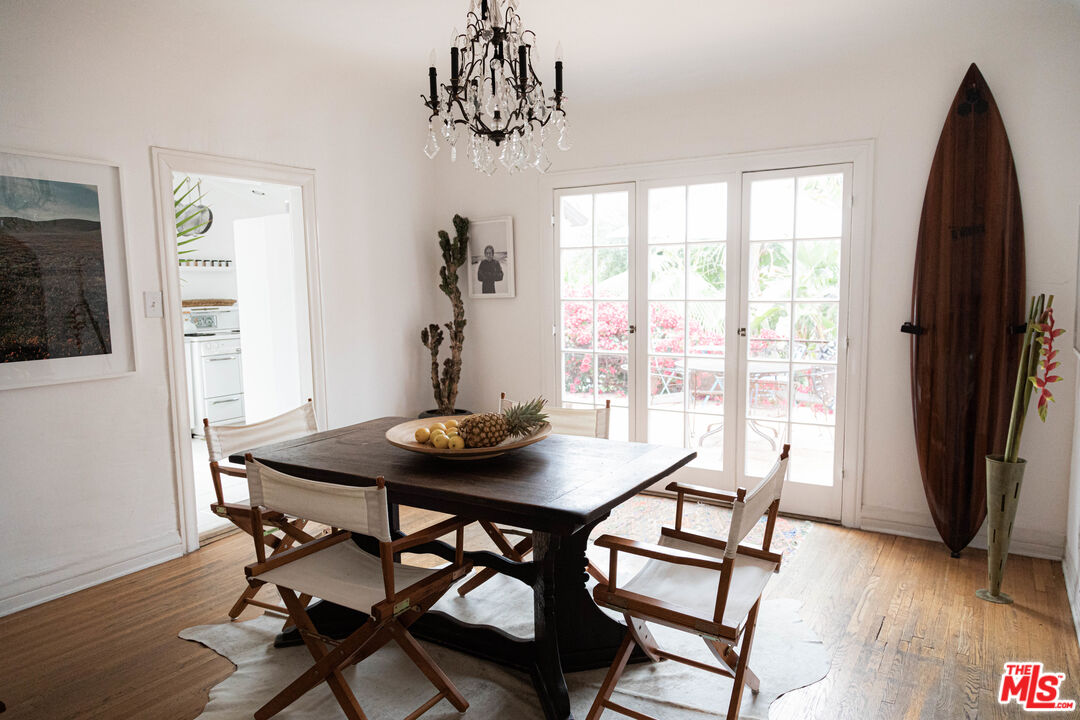 1515 Murray Circle Los Angeles, CA 90026 - Photo 7 of 40 a view of a dining room with furniture window and wooden floor