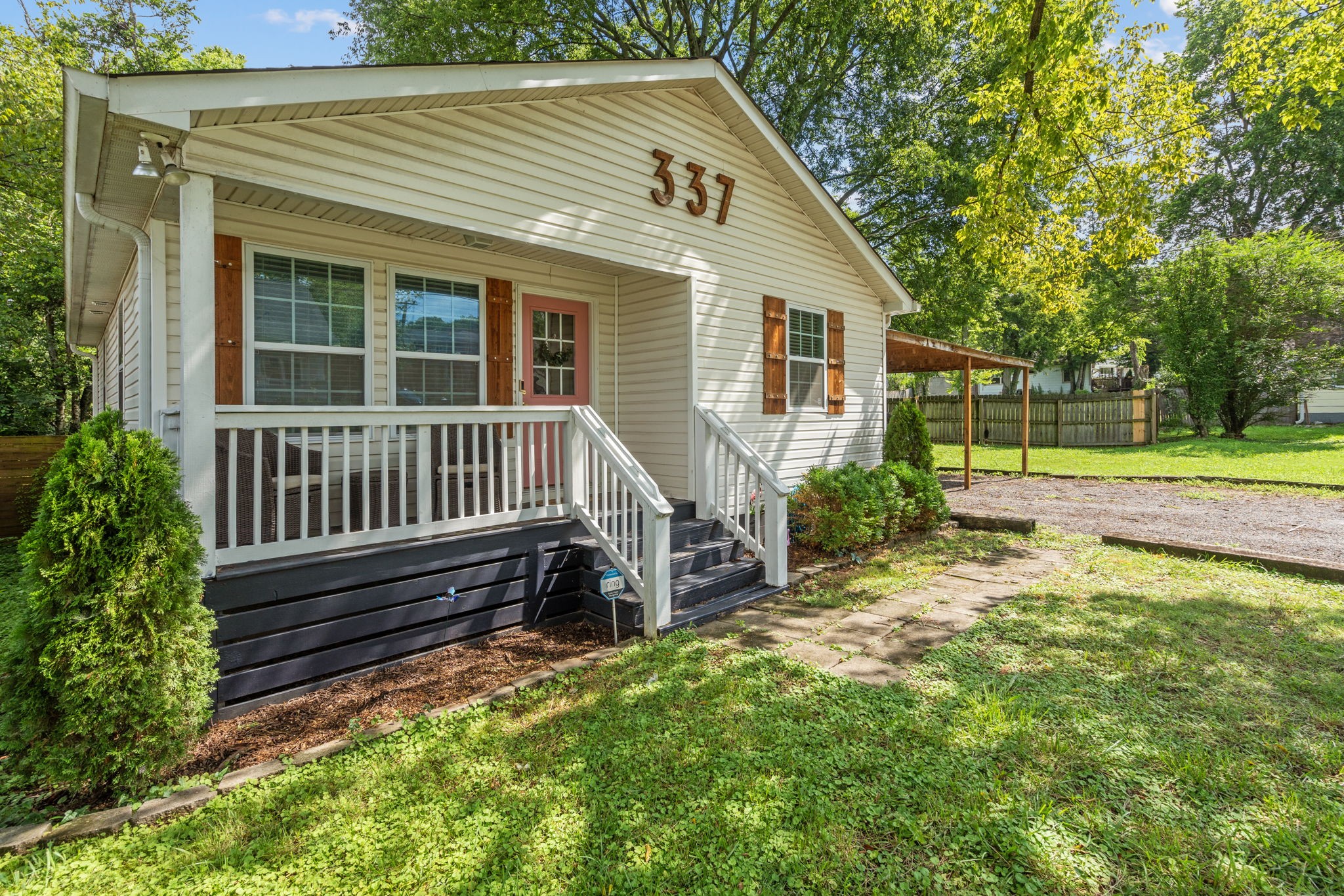 337 Duke Street Nashville, TN 37207 - Photo 1 of 28 a view of a house with backyard and sitting area