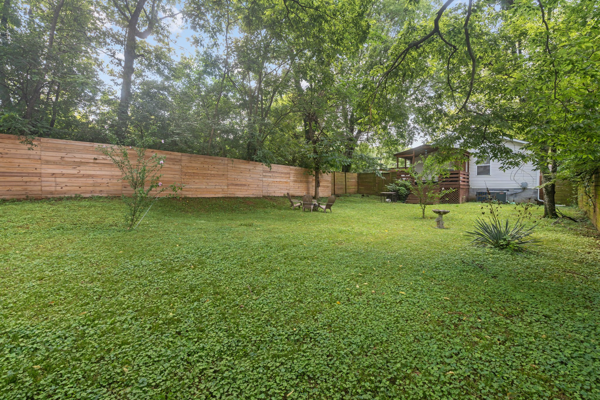 337 Duke Street Nashville, TN 37207 - Photo 12 of 28 a backyard of a house with lots of green space