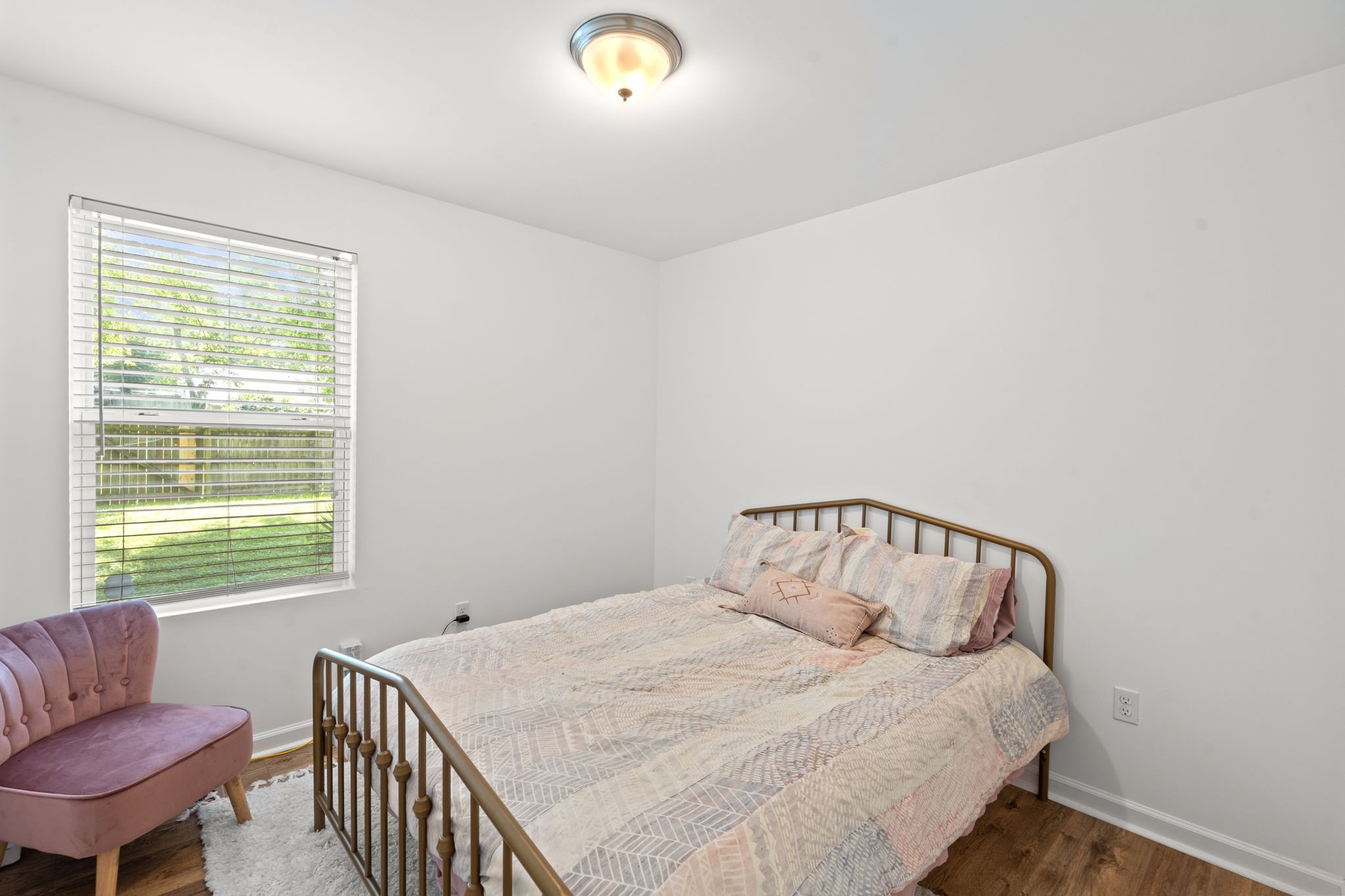337 Duke Street Nashville, TN 37207 - Photo 18 of 28 a bedroom with a bed and a couch
