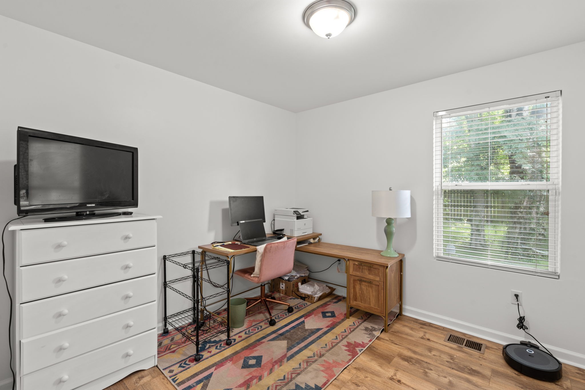 337 Duke Street Nashville, TN 37207 - Photo 20 of 28 a livingroom with a flat screen tv and a window