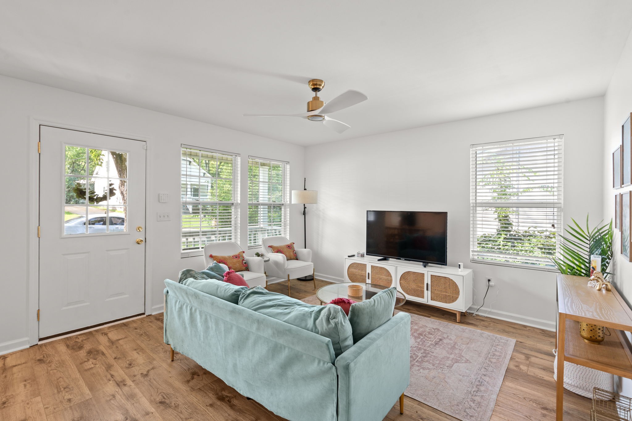 337 Duke Street Nashville, TN 37207 - Photo 2 of 28 a living room with furniture and a flat screen tv