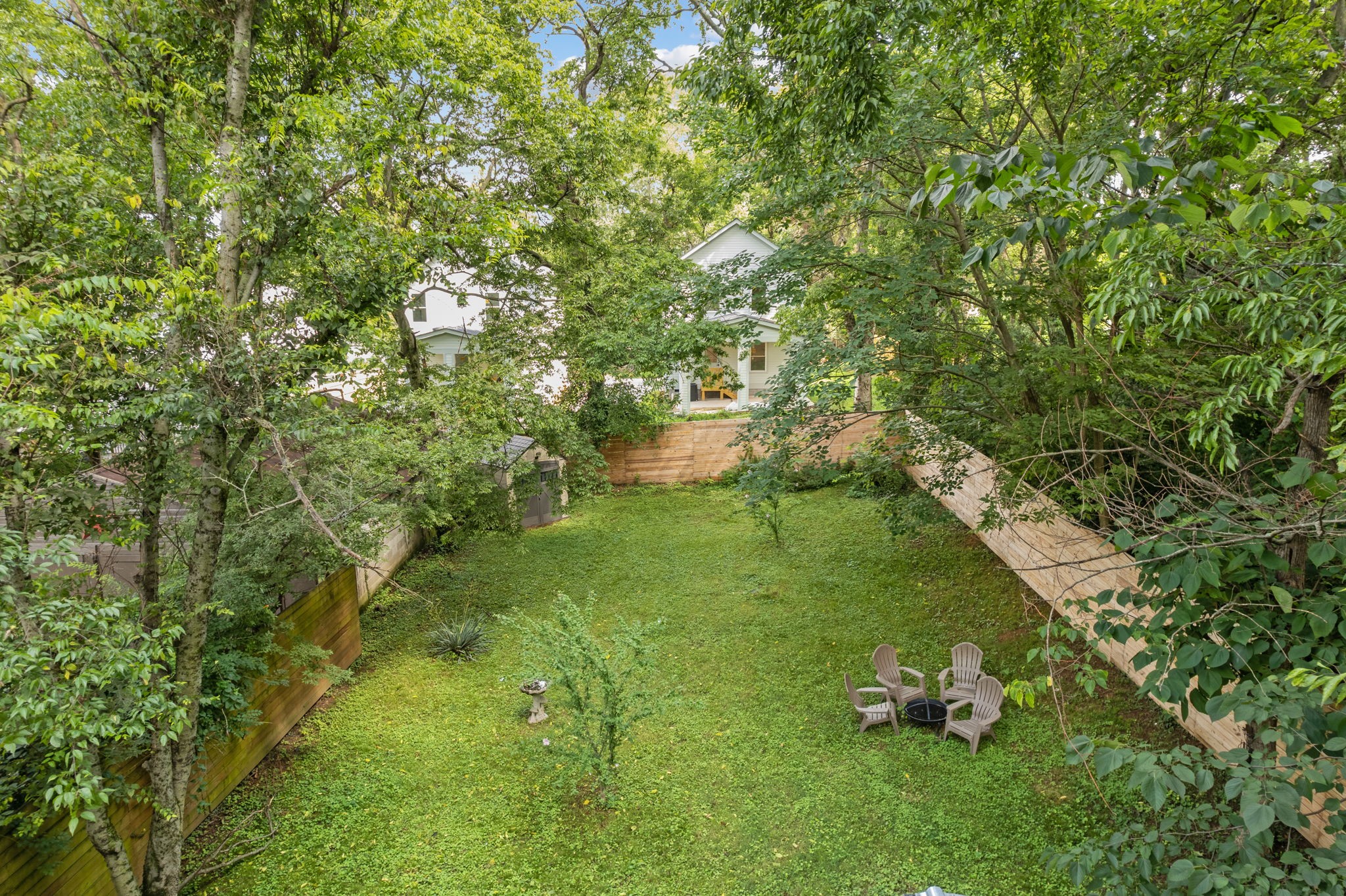 337 Duke Street Nashville, TN 37207 - Photo 23 of 28 a backyard of a house with lots of green space