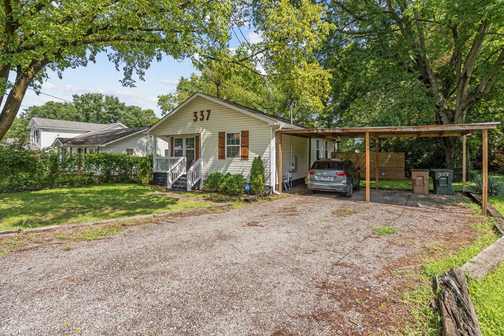 337 Duke Street Nashville, TN 37207 - Photo 27 of 28 a view of a house with porch and garden