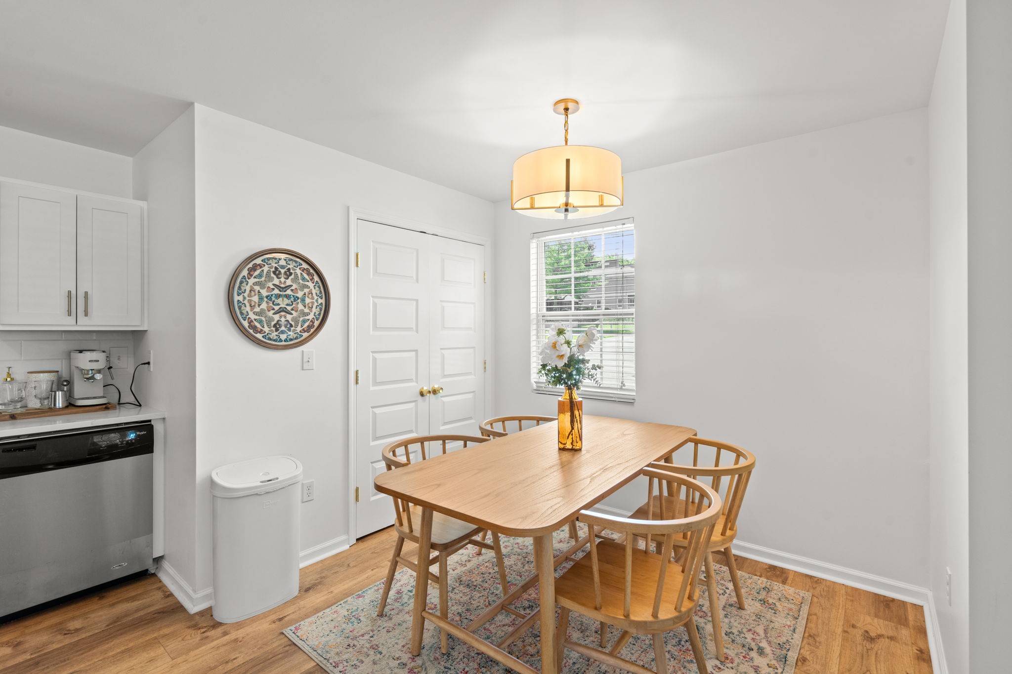 337 Duke Street Nashville, TN 37207 - Photo 4 of 28 a view of a dining room with furniture and a chandelier