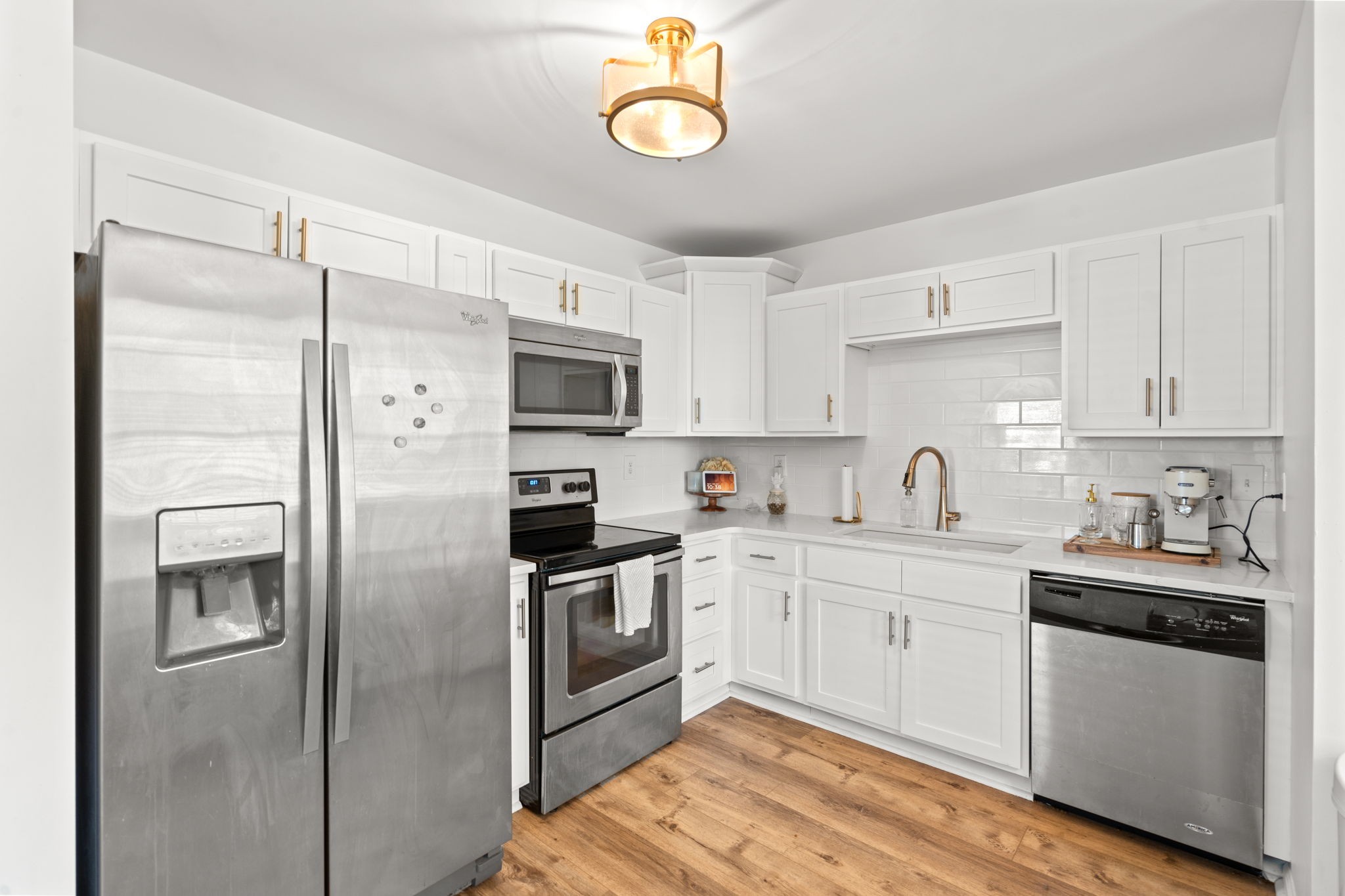 337 Duke Street Nashville, TN 37207 - Photo 5 of 28 a kitchen with a sink cabinets and stainless steel appliances