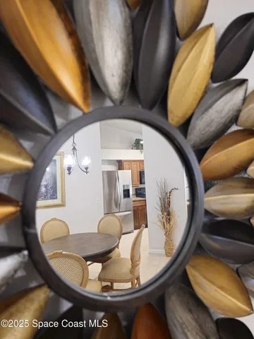 a very nice looking dining room with a table and chairs