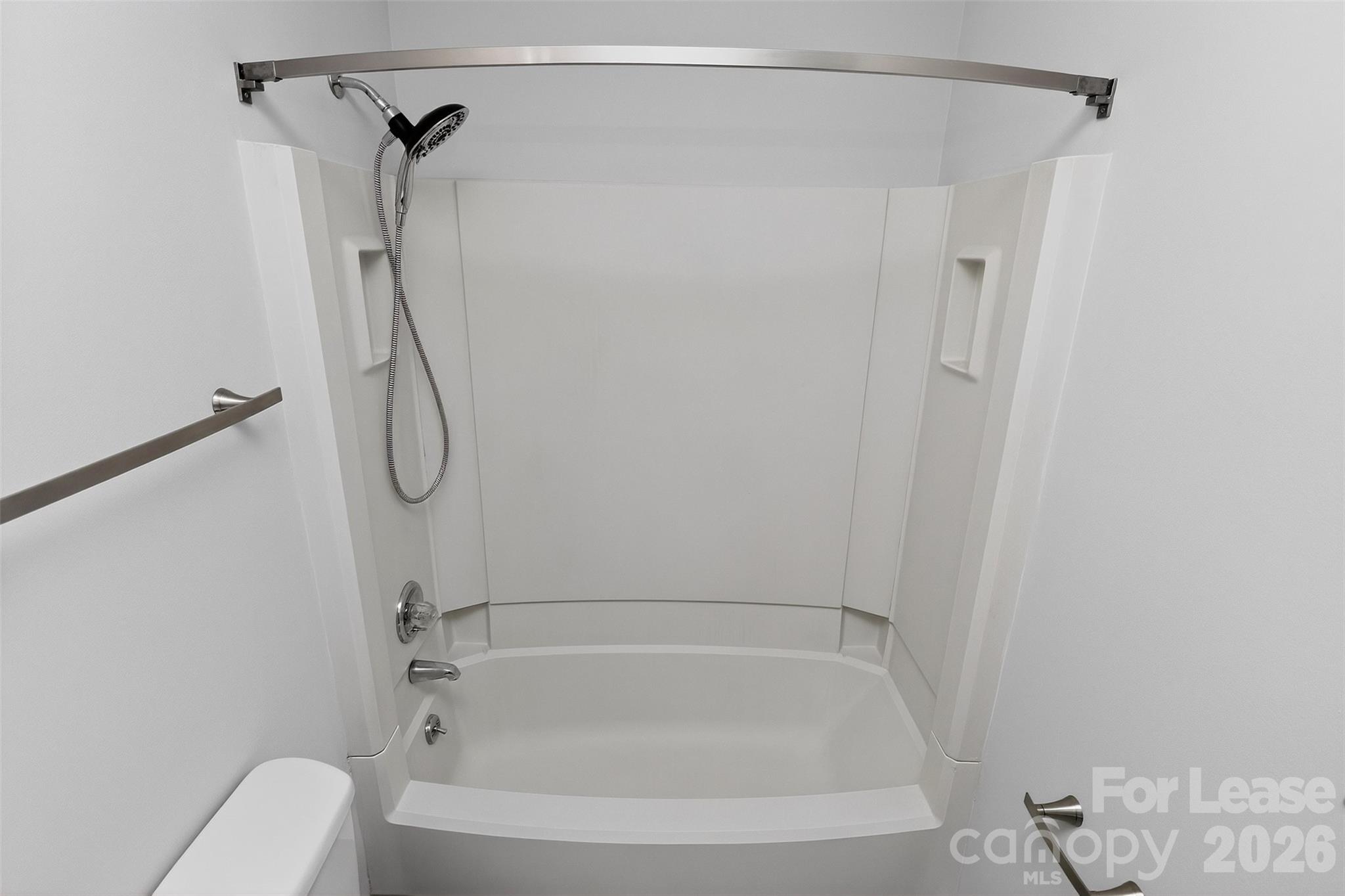11029 Harrowfield Road Charlotte, NC 28226 - Photo 23 of 41 a bathroom with a bath tub with a shower