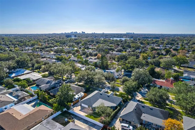 an aerial view of a city with lots of residential buildings