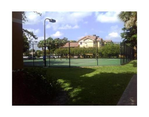 9033 Wiles Road, Unit 3084 Coral Springs, FL 33067 - Photo 11 of 15 Tennis Court