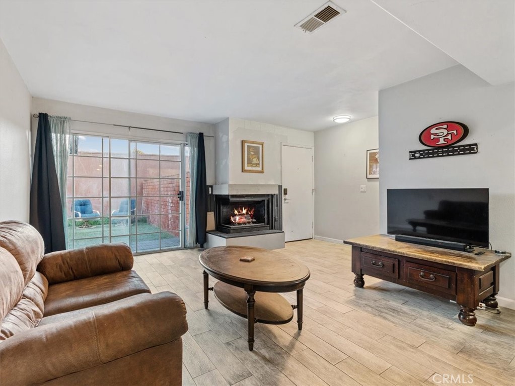 2403 Country Santa Maria, CA 93455 - Photo 7 of 29 a living room with furniture and a flat screen tv