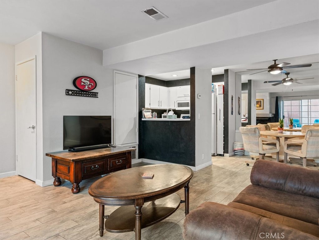2403 Country Santa Maria, CA 93455 - Photo 8 of 29 a living room with furniture and a flat screen tv