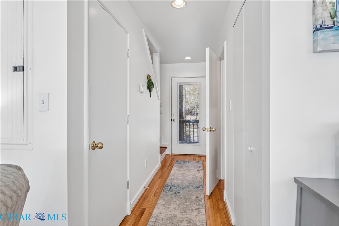 172 Sturgeon Creek Road Deltaville, VA 23043 - Photo 4 of 50 Corridor featuring recessed lighting, light wood-style flooring, and electric panel