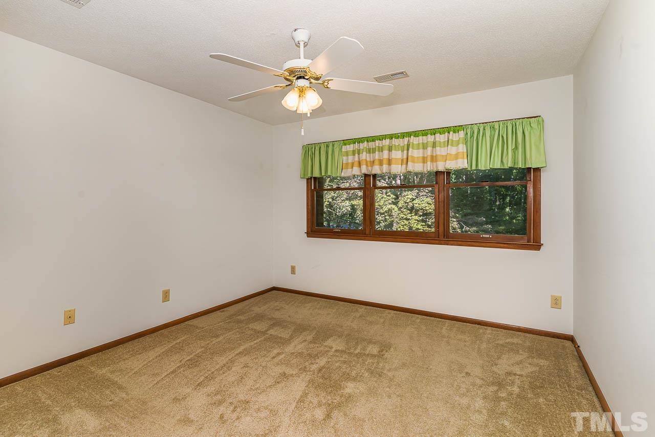 8600 Lawn Court Raleigh, NC 27613 - Photo 18 of 31 a view of an empty room with a window