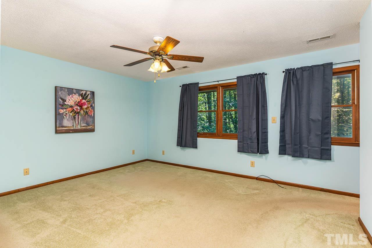 8600 Lawn Court Raleigh, NC 27613 - Photo 20 of 31 a view of an empty room with a window