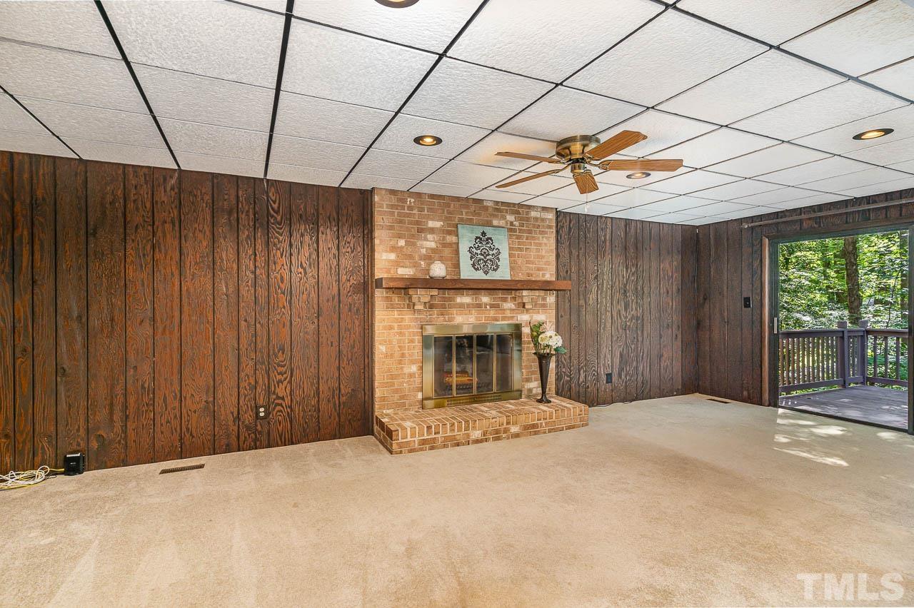 8600 Lawn Court Raleigh, NC 27613 - Photo 24 of 31 a view of an empty room with a fireplace