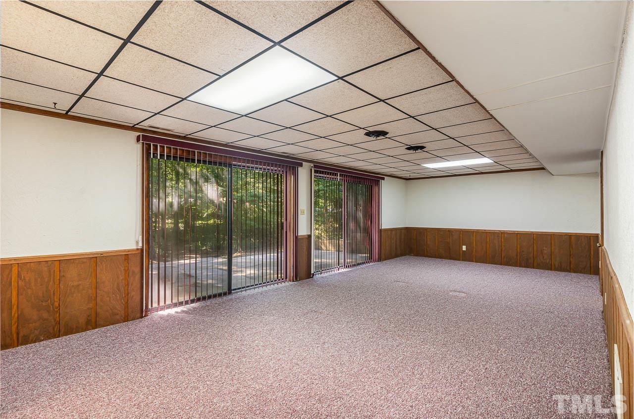 8600 Lawn Court Raleigh, NC 27613 - Photo 28 of 31 a view of large room with large windows