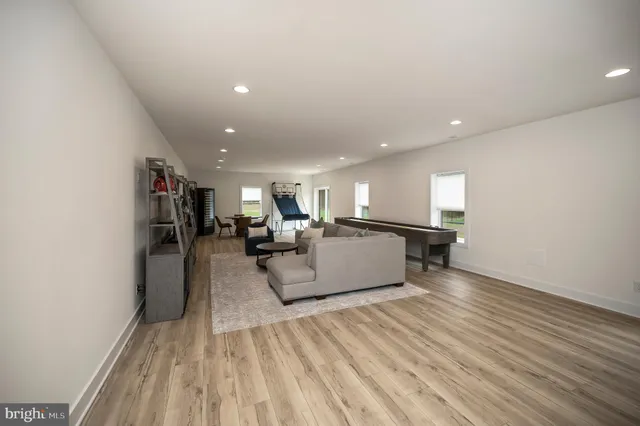 a living room with furniture and a table