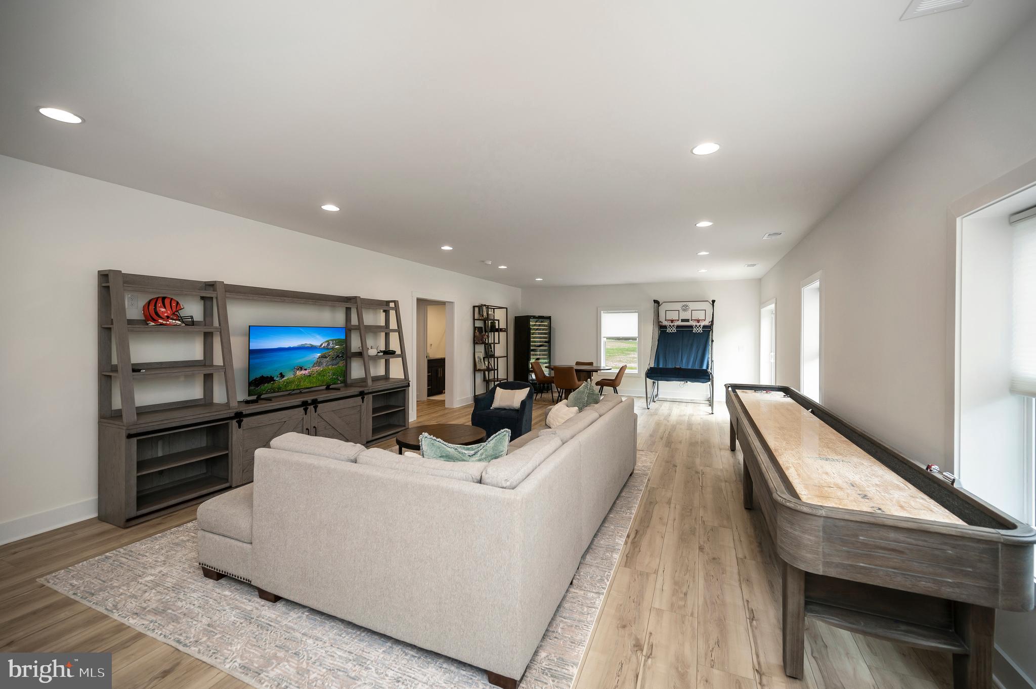 0 Piney Mountain Road Warrenton, VA 20186 - Photo 30 of 33 a living room with furniture and a flat screen tv
