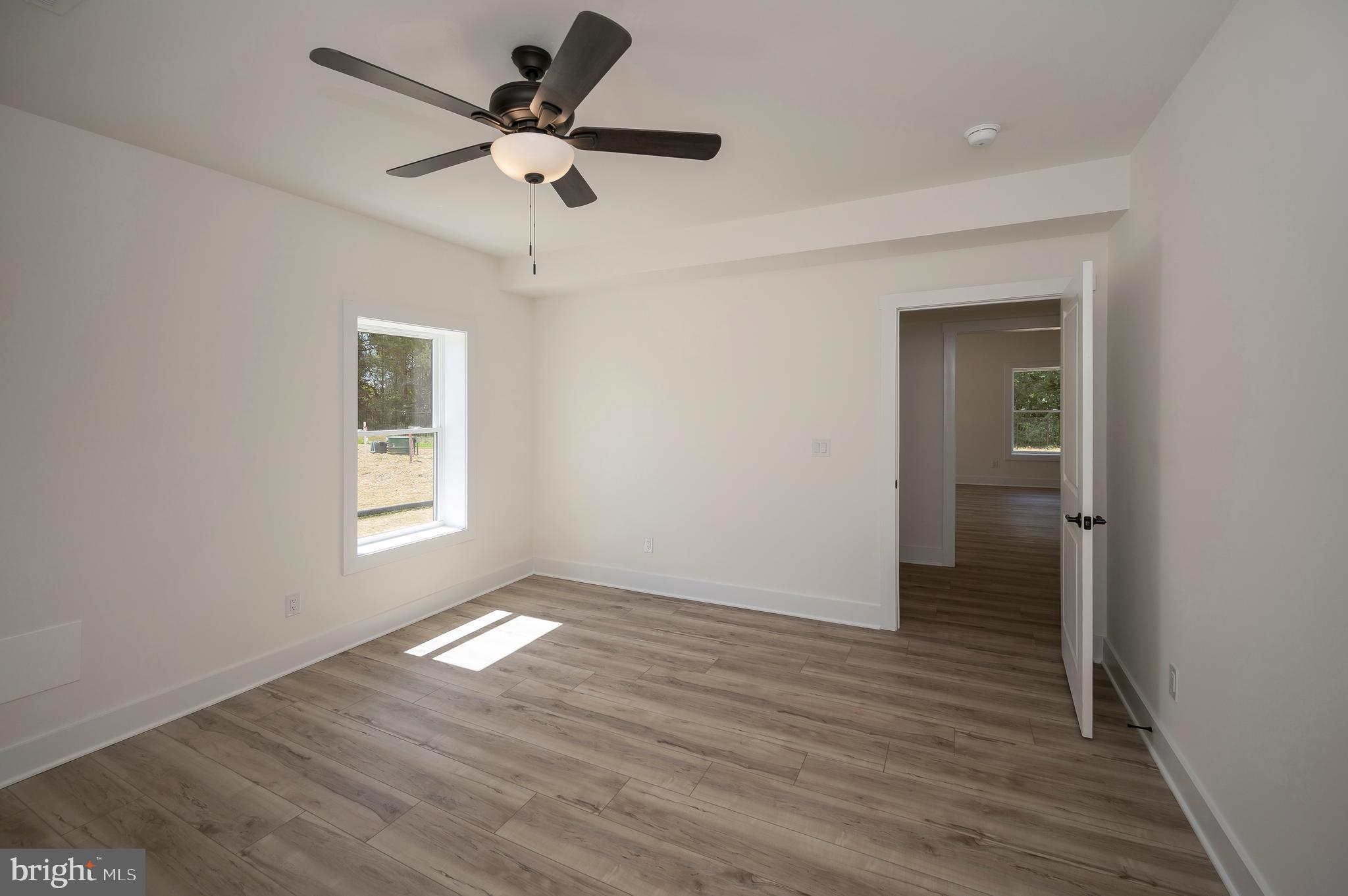 0 Piney Mountain Road Warrenton, VA 20186 - Photo 32 of 33 wooden floor in an empty room with a window