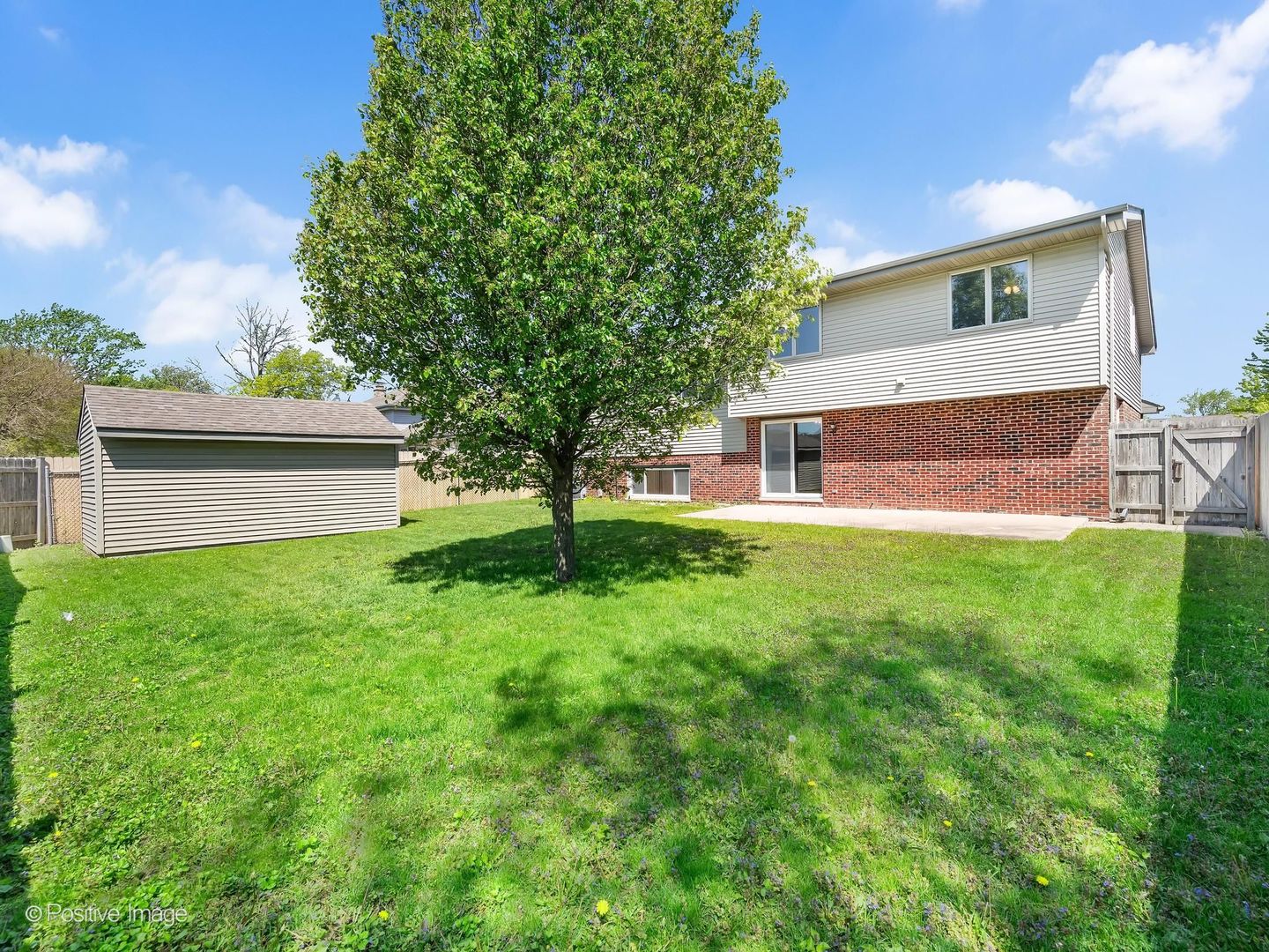 3235 192nd Street Lansing, IL 60438 - Photo 23 of 28 a view of house with backyard