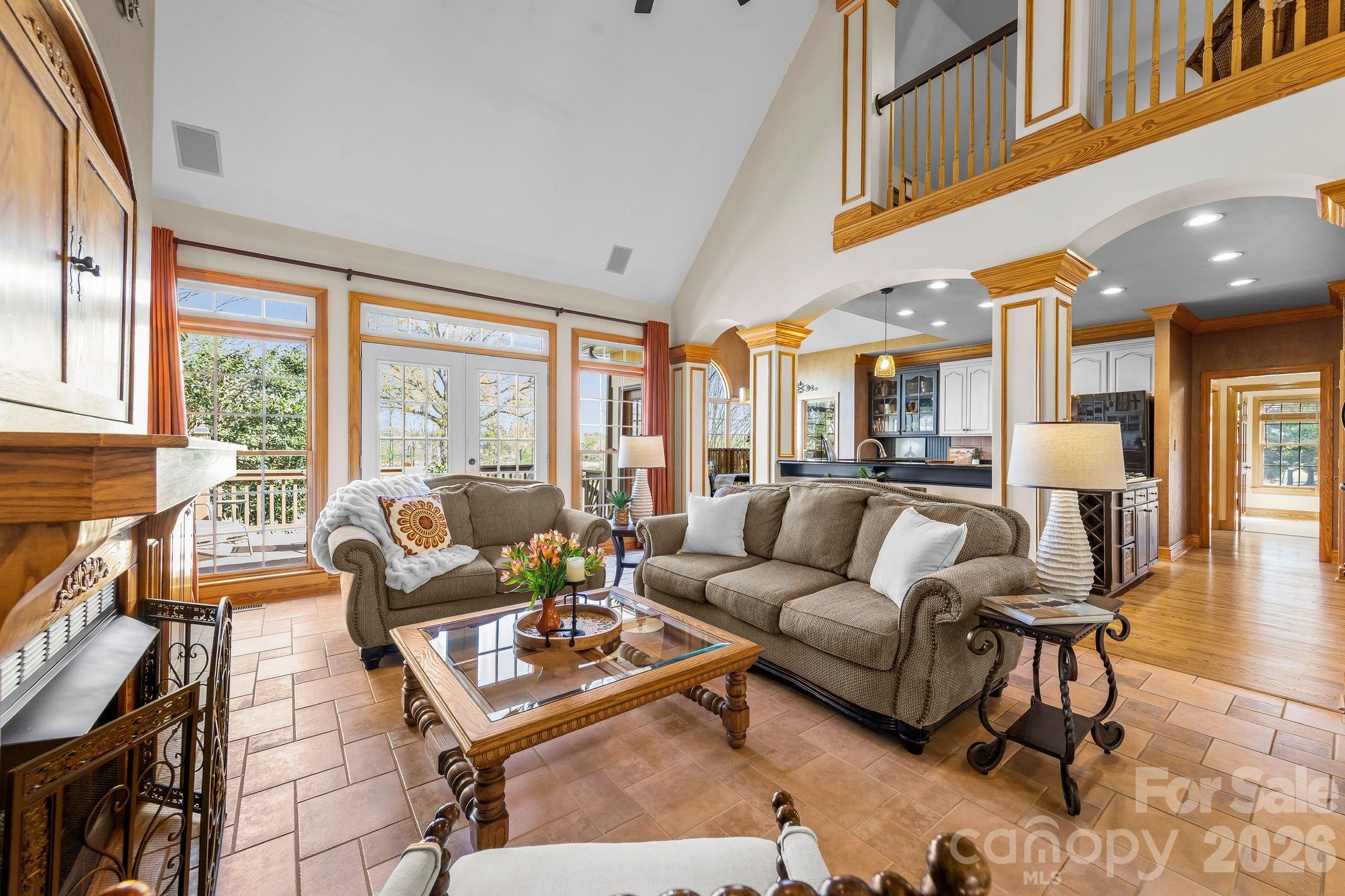 3530 Cardiff Lane Matthews, NC 28104 - Photo 12 of 39 a living room with furniture and a large window