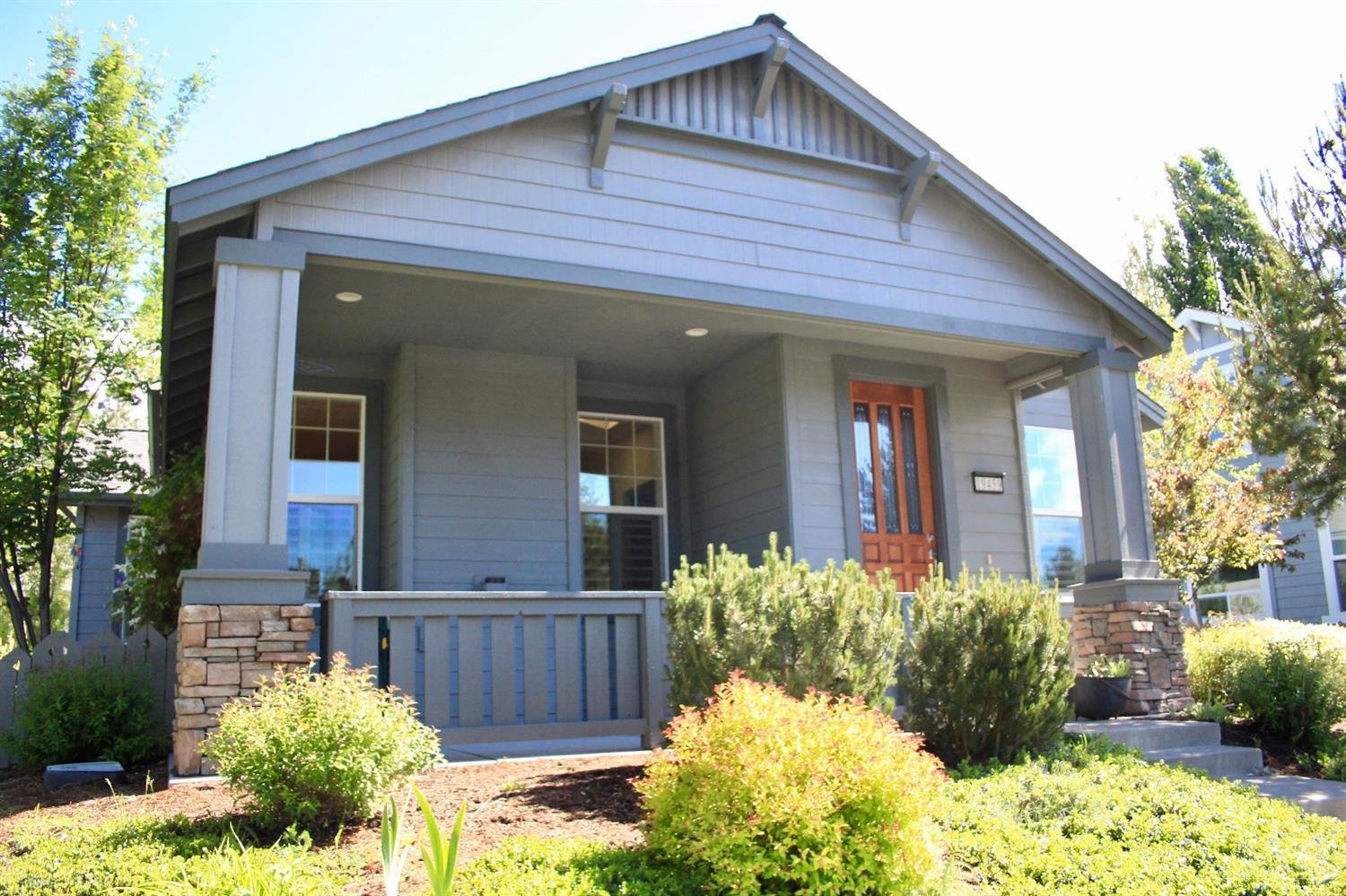 19459 Blue Lake Loop Bend, OR 97702 - Photo 1 of 19 a front view of a house with a yard